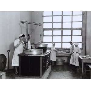  Cooks Working in the Kitchen of the Company Cafeteria of 