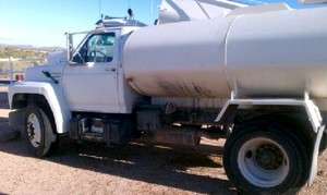 1990 FORD 2000 GALLON WATER TRUCK  