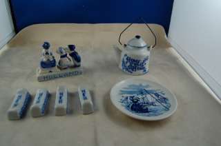   Painted Blue Delfts 7 Pieces Teaopt, Weights,Plate, Kissing People