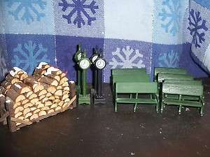   VILLAGE ASSORTED (LOT OF 14) GREEN IRON BENCHES TOWN CLOCKS LOG PILES