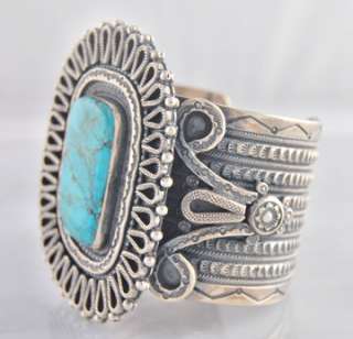 Description Sterling Silver Turquoise Bracelet. Accenting the 