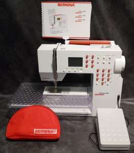 Bernina Activa 220 Sewing Machine comes with book accesorcies and 