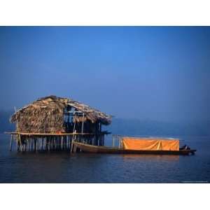 Thatched Stilt House and Boat on Orinoco Delta, Delta Amacuro 