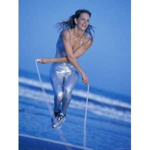  Young Woman Exercising with a Jump Rope Photographic 