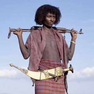 Nomadic Afar Tribe Wear their Hair Long and Carry Large Curved Daggers 