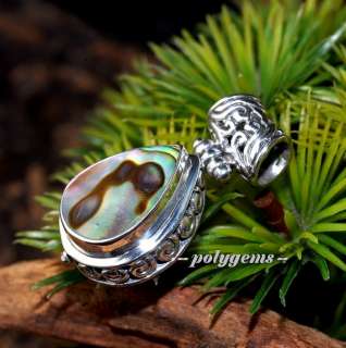   with teardrop angelic abalone shell handcrafted using the traditional