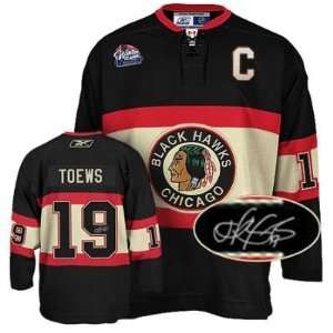  Jonathan Toews Signed Jersey   Winter Classic 09 Rep 