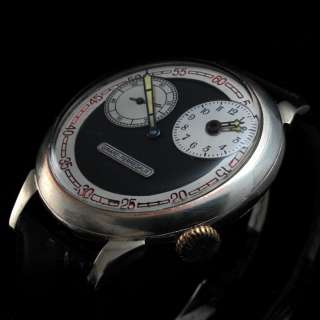 this timepiece features a handsome steel basic dial in excellent