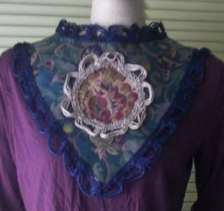 This is a fabulous upholstery/drapery fabric collar with blue 