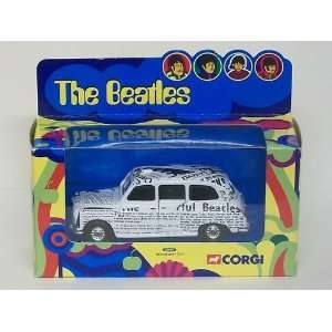   The Beatles Collectible Die Cast Newspaper London Taxi Toys & Games