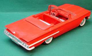 1960 Chevy Impala Conv. in Roman Red