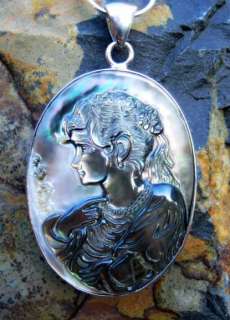 This beautiful portrait cameo pendant literally represents Feminine 