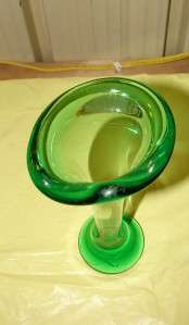   beautiful green glass vase this is for a very pretty green glass