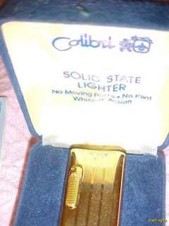 Vintage Colibri Solid State Goldtone Lighter MIB  