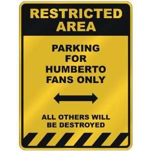  RESTRICTED AREA  PARKING FOR HUMBERTO FANS ONLY  PARKING 