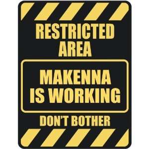   RESTRICTED AREA MAKENNA IS WORKING  PARKING SIGN