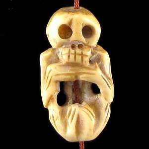   31mm ox bone hand carved skull pendant bead