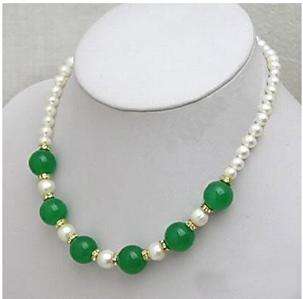 Beautiful white Pearl Necklace with green Emerald  