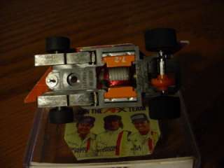   SUPER G PLUS CHASSIS WITH ORANGE MAGNETS & GEARS ho slot car  