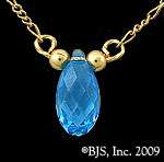   gold filled chain holds a blue Swarovski Crystal in the center of your