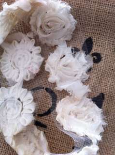  organza rose trim with a tulle backing given an aging treatment for a