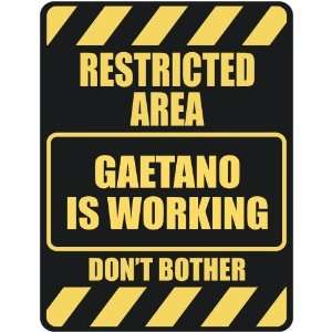   RESTRICTED AREA GAETANO IS WORKING  PARKING SIGN