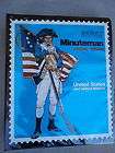Minuteman Stamp Album with collection of over 225 stamps from 1861 to 