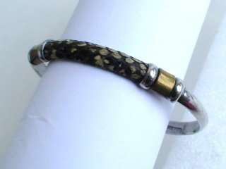   silver and brass cuff bracelet genuine snakeskin but i do not know