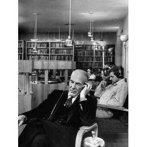  Poet Archibald MacLeish Listening to a Recording at the 