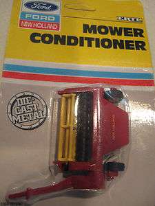 Ertl 1/64 diecast toy farm Ford New Holland Mower Conditioner  