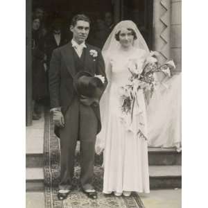  Newly Wedded Couple in Formal Dress He with a Buttonhole 