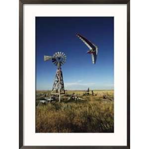 Hang Glider Swoops Low over an Old Windmill Collections Framed 