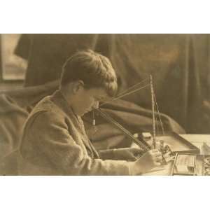  1924 child labor photo Miscellaneous. Boy with mechanical 